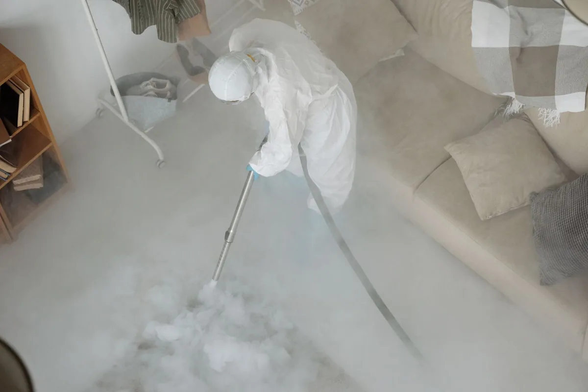 Biohazard cleanup technician in protective equipment, Happy Valley, OR